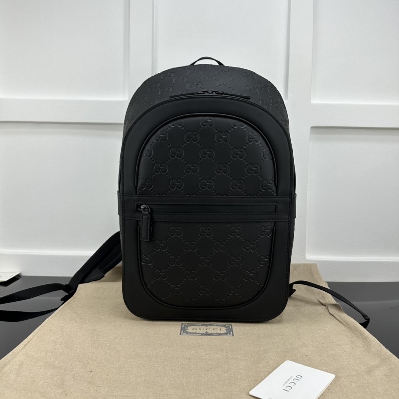 G*u*i backpacks